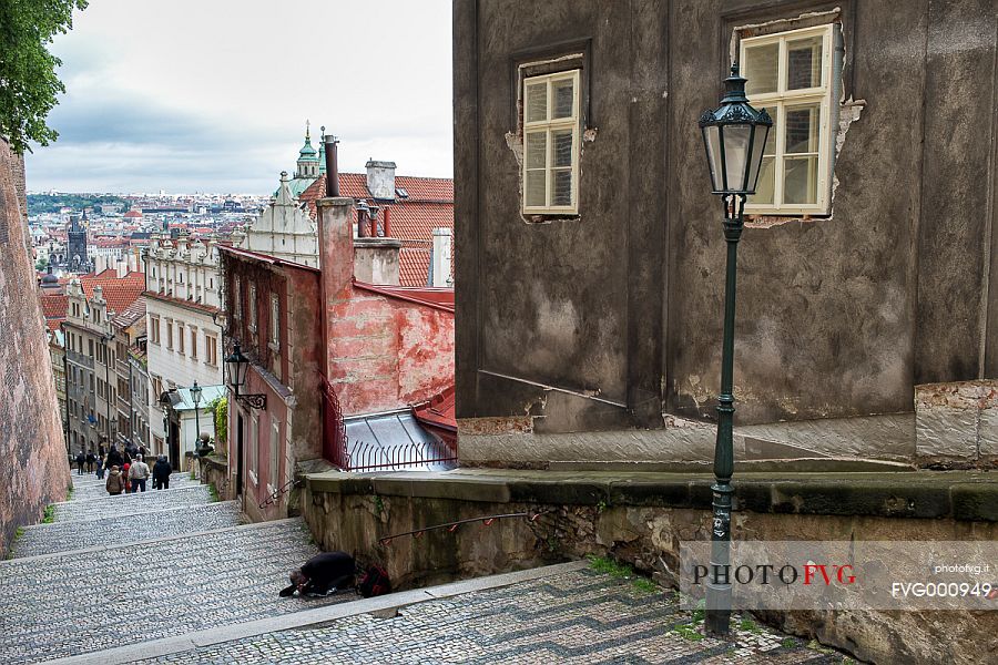 A street descending Castle hill in Prague Old Town, Mala Strana A street descending Castle hill in Prague Old Town, Mala Strana