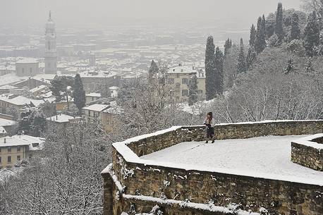 Lower city of Bergamo from the venetian walls of the upper city after a snowfall