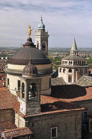 Clock Tower and Dome of the Cathedral, Clock Tower and Dome of the Basilica in the upper city of Bergamo, view from Torre del Gombito Clock Tower and Dome of the Cathedral, Clock Tower and Dome of the Basilica in the upper city of Bergamo, view from Torre del Gombito