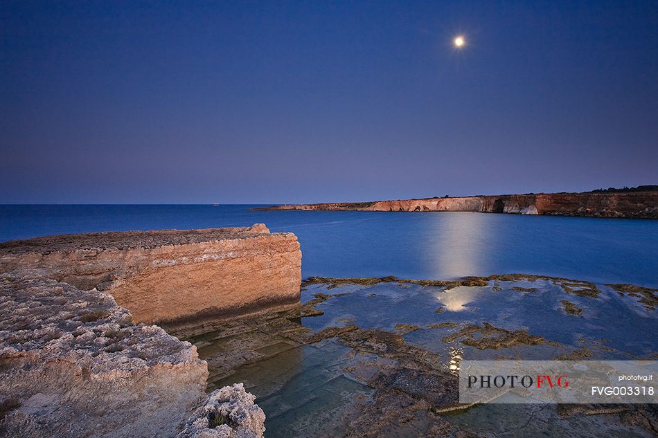 The moon reflecting on the sea of the Maddalena Peninsula