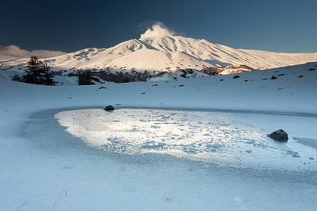 A ice slab inside one of the Sartorius craters , in the background Monte Frumento