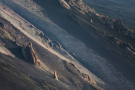 Magmatic dykes along the canyons of volcanic sand in the Valle del Bove