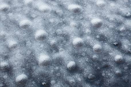 Bubble ice and snow on Stokksnes beach