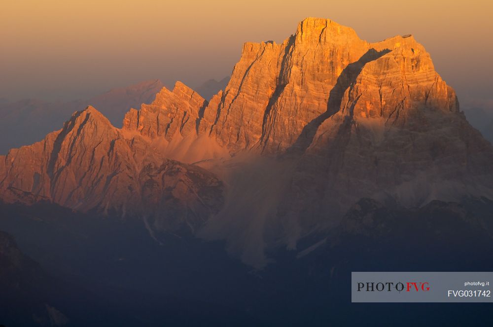 Sunset from the top of Piz Bo in the Sella mounatin group towards Pelmo peak, dolomites, Italy