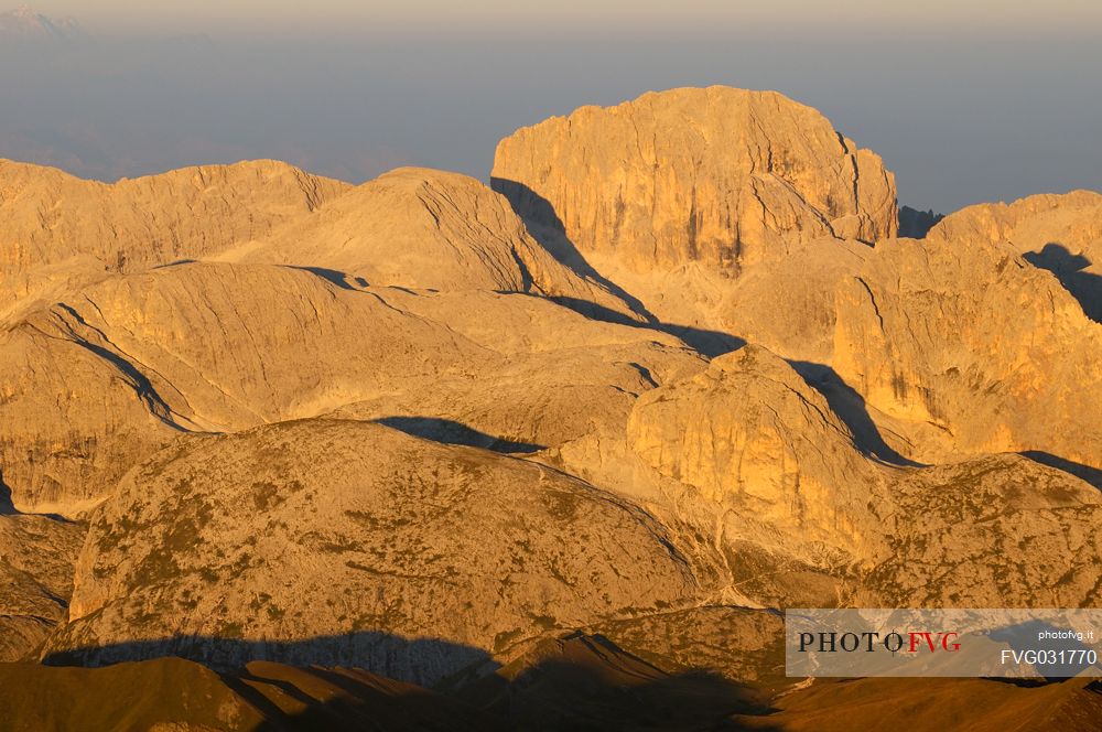 Sunrise from the top of Piz Bo in the Sella mountain group towards Catinaccio mountain group, dolomites, Italy