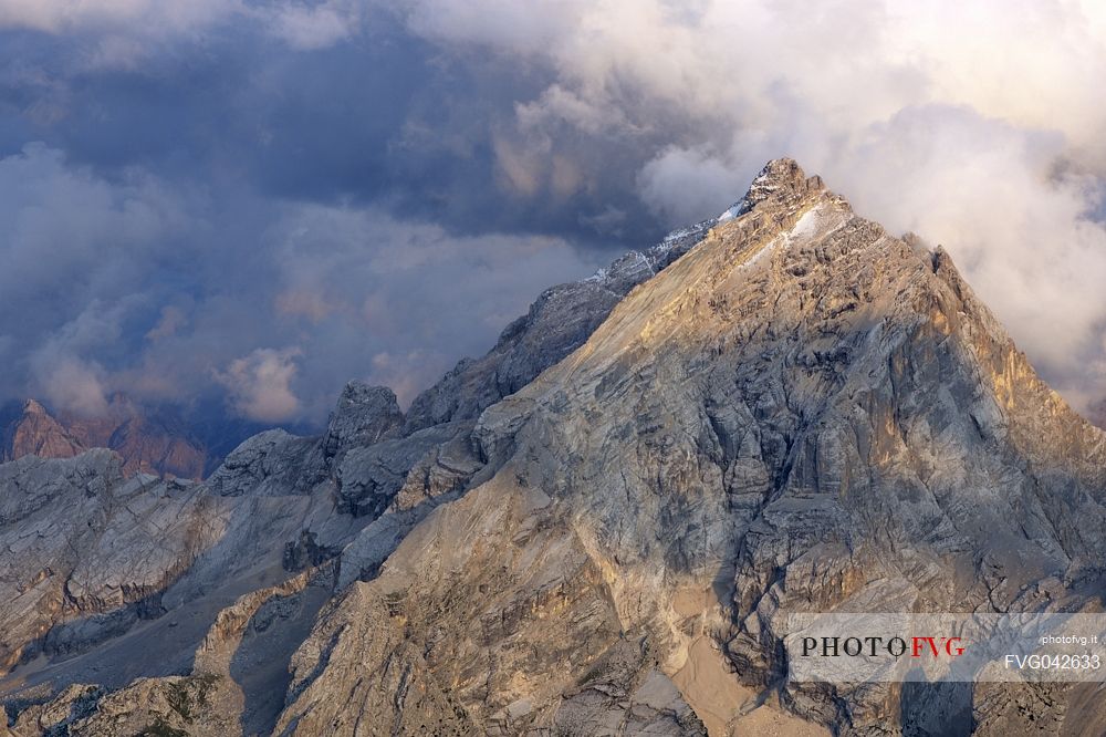 Monte Antelao peak at sunset in the storm from the top of Tofana di Mezzo, Cortina d'Ampezzo, dolomites, Italy.