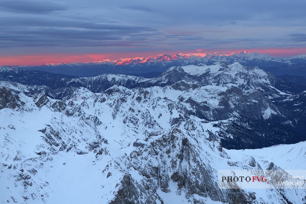 Winter panorama at dawn from Punta Rocca (3265 m), one of the peaks of the Marmolada and in the background the Lagorai mountain group, dolomites, Veneto, Italy, Europe