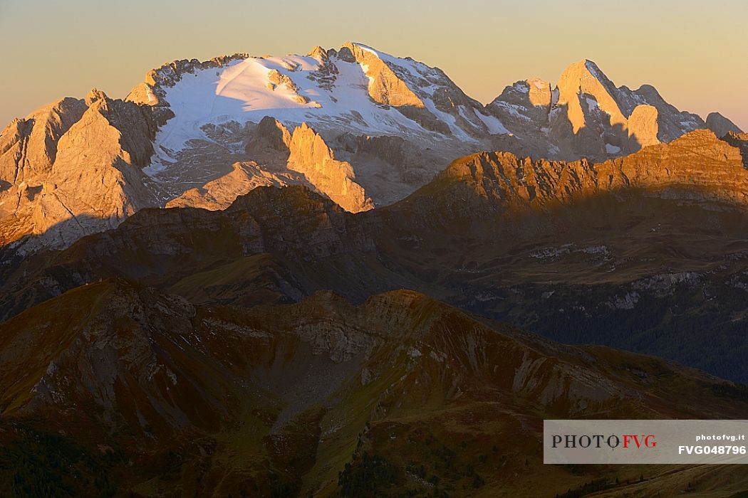 Views from Mount Lagazuoi with the first intense autumn lights, in the background the Marmolada and Gran Vernel mounts, dolomites, Veneto, Trentino, Italy, Europe.
