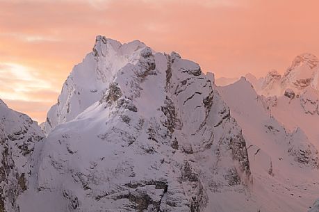 After a heavy snowfall on a cold winter morning, sunrise from Misurina towards the Marmarole mountain group.
At sunrise the Marmarole are wrapped in a pink-colored snow storm, dolomites, Auronzo, Veneto, Italy, Europe