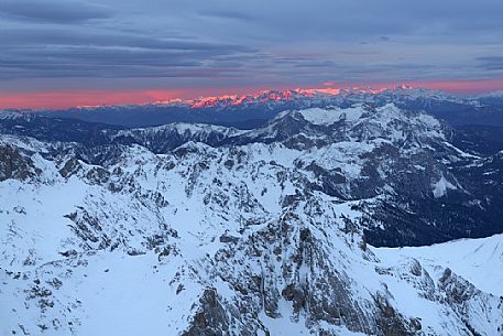 Winter panorama at dawn from Punta Rocca (3265 m), one of the peaks of the Marmolada and in the background the Lagorai mountain group, dolomites, Veneto, Italy, Europe