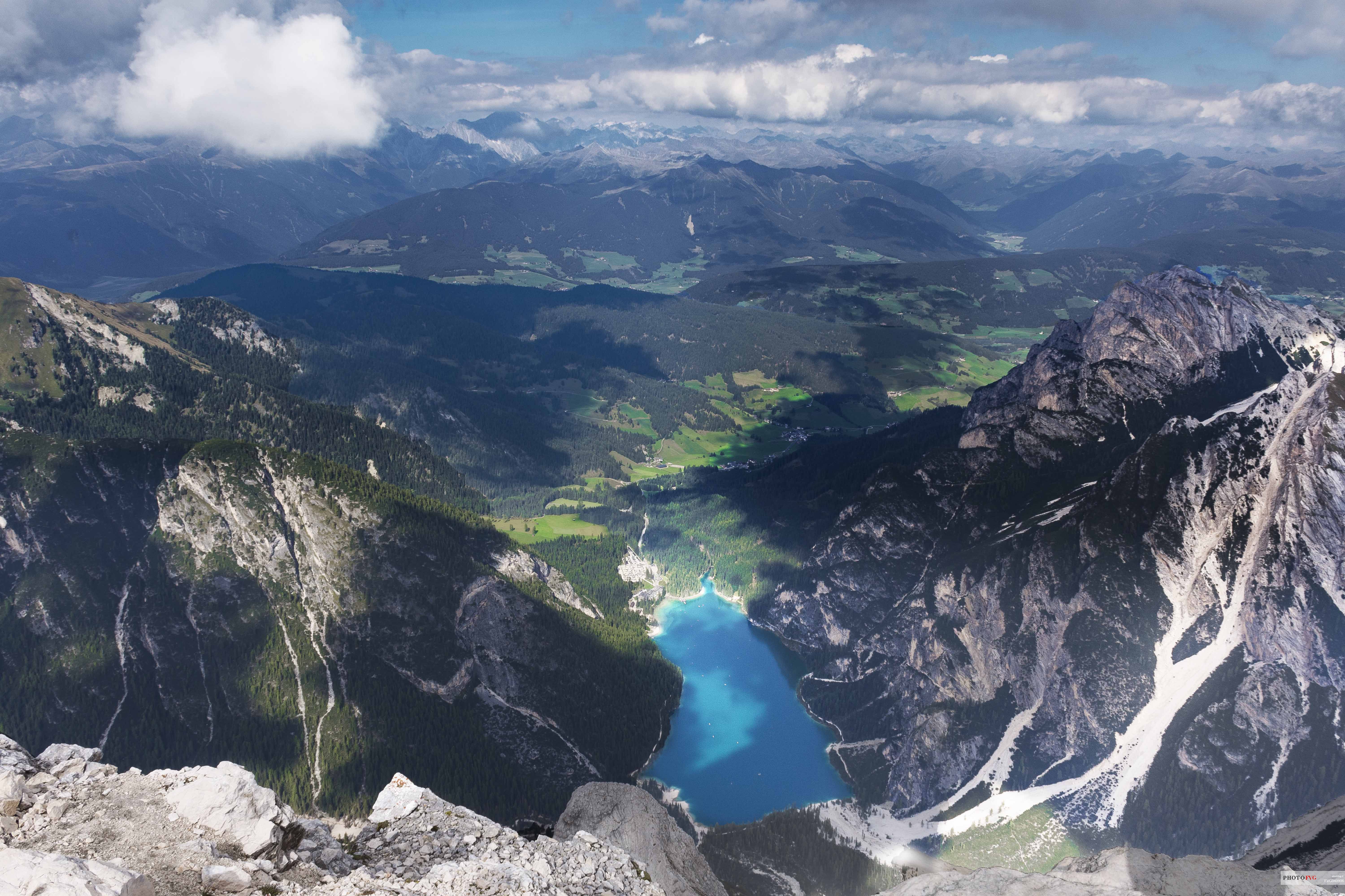 Aerial view of the Braies lake from Croda del Becco or Seekofel peak, dolomites, South Tyrol, Italy, Europe