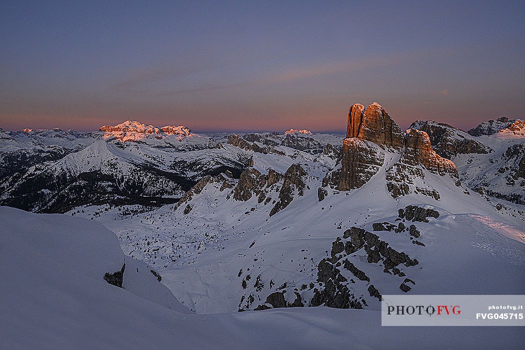 Averau mount and in the background the Sella mountain group from the top of Nuvolau mount at sunrise, dolomites, Cortina d'Ampezzo, Veneto, Italy, Europe