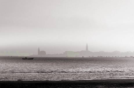 The promenade of Caorle on a evening of autumn, Santuario della Madonna dell'Angelo in background, Adriatic coast,  Veneto, Italy, Europe