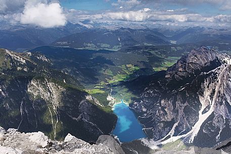 Aerial view of the Braies lake from Croda del Becco or Seekofel peak, dolomites, South Tyrol, Italy, Europe