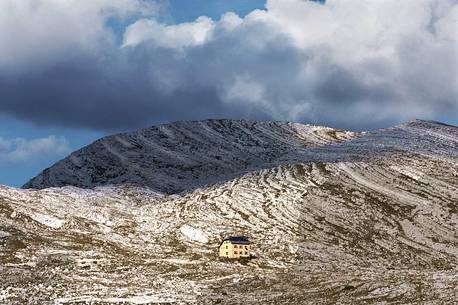 Biella hut  or Seekofel hutte and in the background the Croda del Becco peak, dolomites, Cortina d'Ampezzo, Veneto