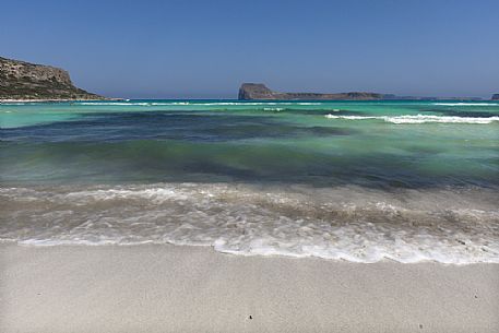 The fantastic colors of the Balos lagoon and in the background the Imeri Gramvousa island in the north of Crete island, Greece