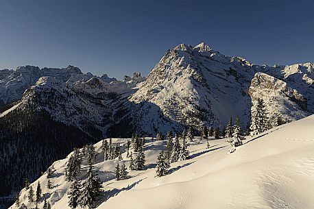 Val Popna separates Mount Popna from Cristallino di Misurina, in the background the majestic Sorapiss and to the right the Corno d'Angelo and the Torri del Popna, dolomites, Veneto, Italy, Europe