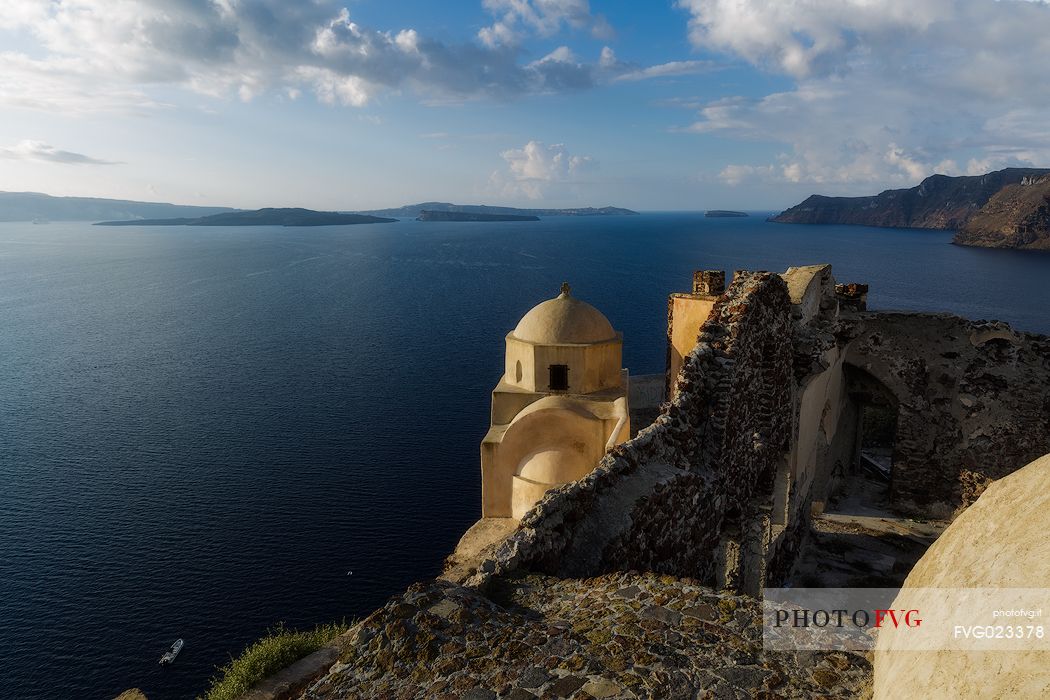 Caldera view from old ruins church of Oia village, Santorini island, Greece
