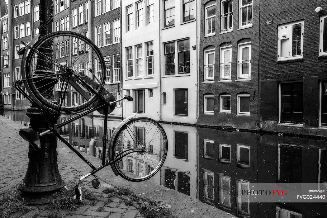 Hanging biclycle,  the dutch symbol, Amsterdam, Holland 