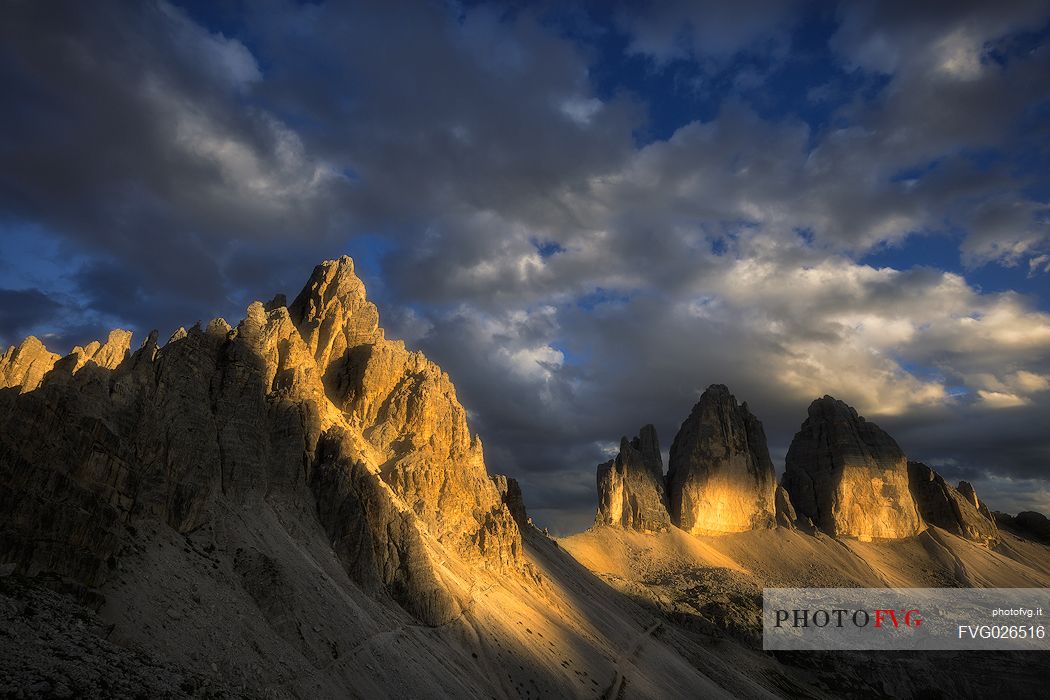 Tre Cime di Lavaredo and Paterno moutanins painted by sunlight, dolomites, South Tyrol, Italy