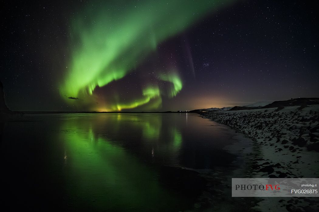 Northern lights at Reynisfjara lagoon, Iceland