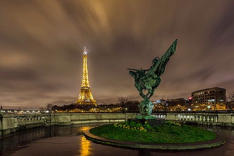 Tour Eiffel and Jeanne D'arc statue, Paris, France
