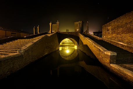 Triple bridge, Ponte dei Trepponti, called Ponte Pallotta (1638 Luca Danese architect), famous bridge landmark of town of Comacchio