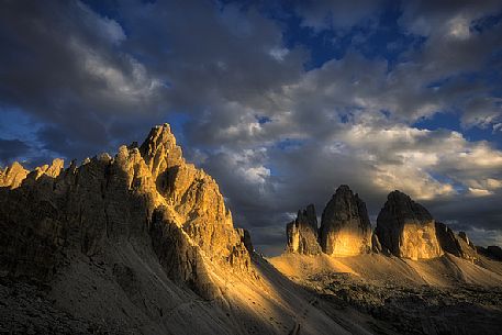 Tre Cime di Lavaredo and Paterno moutanins painted by sunlight, dolomites, South Tyrol, Italy