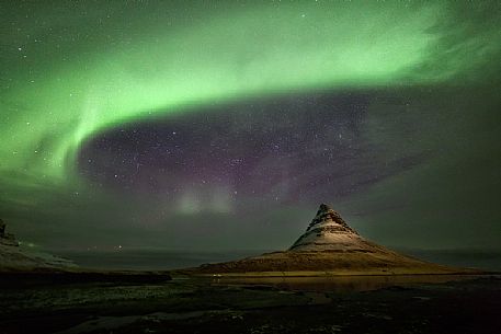 Aurora borealis ring around Kirkjufell mountain, Iceland