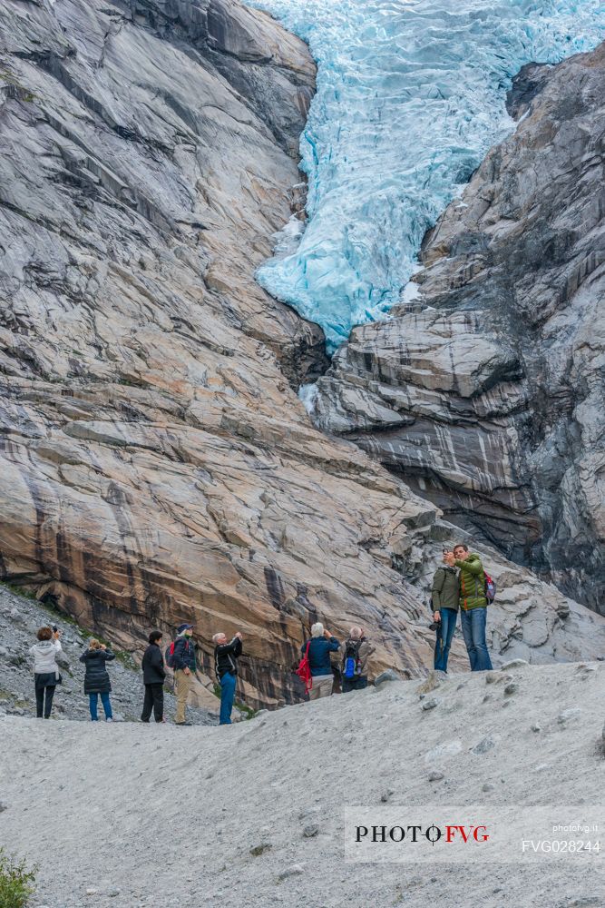 Tourists at Briksdal Glacier, Briksdalsbreen, Norway