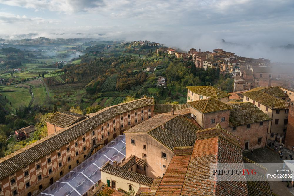 Foggy morning in San Miniato village, Tuscany, Italy