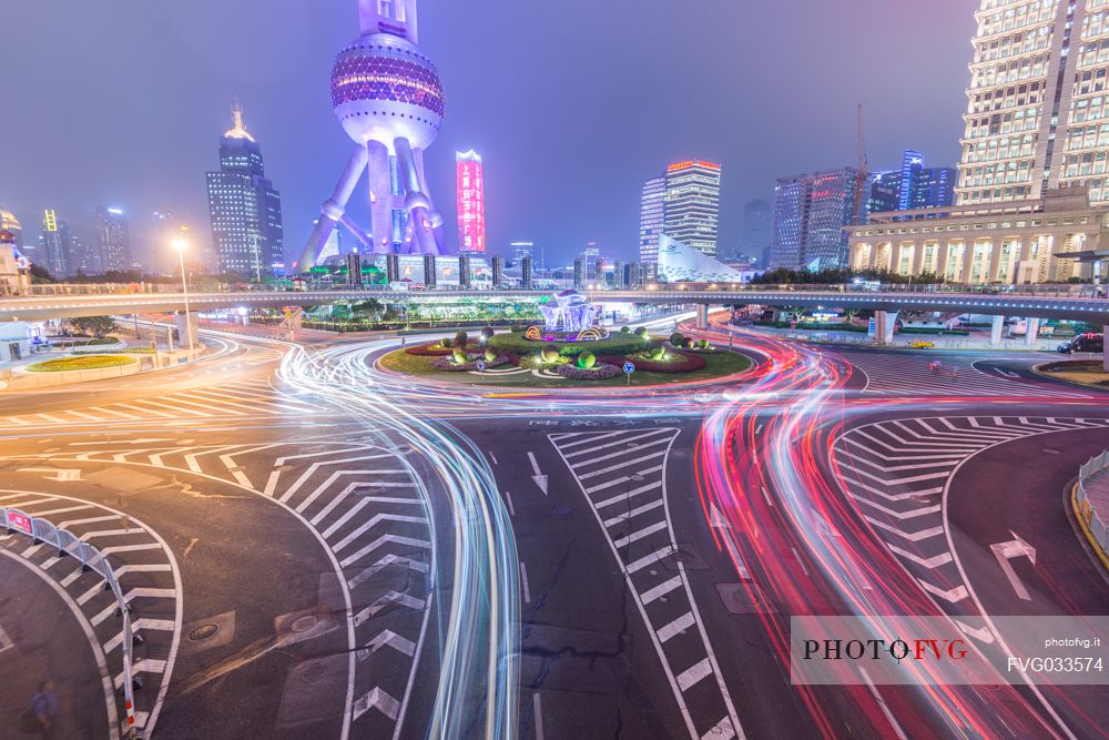 Night view of a roads in Lujiazui New Financial District with Oriental Pearl Tower in Shanghai city, China