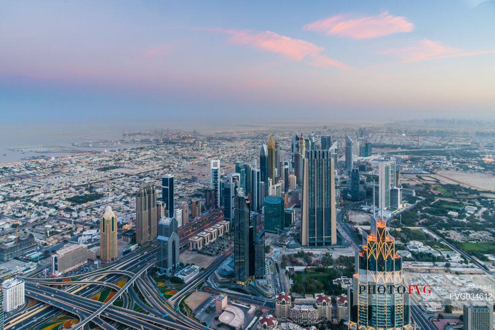 Sunrise from the top panoramic platform on Burj Khalifa across Sheikh Zayed Road and the high rises, Downtown Dubai, Emirate of Dubai, UAE, Asia