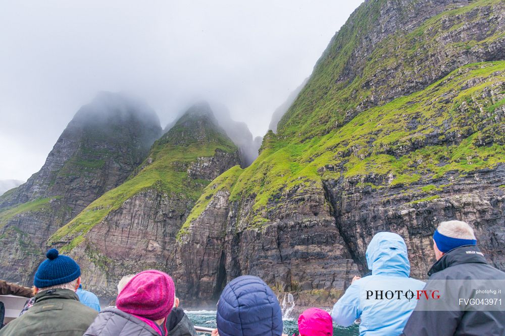 Tourist boat at Vestmanna Sea Cliffs, Streymoy, Faeroe Islands, Denmark, Europe