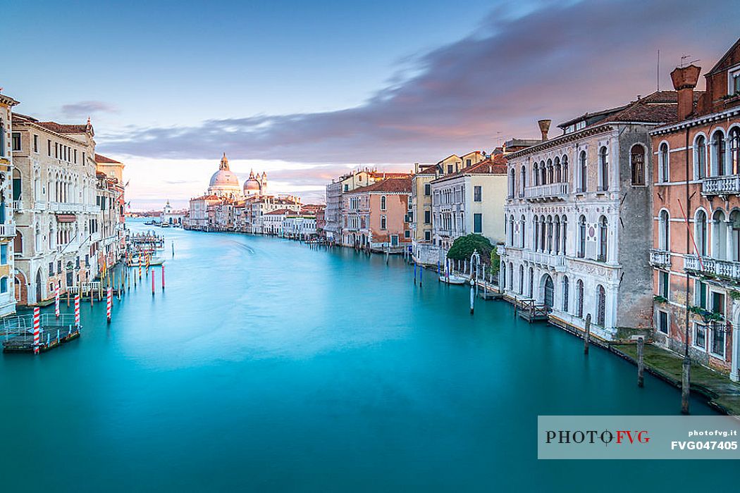 The Grand Canal and in the background the Santa Maria della Salute church from Accademia bridge at twilight, Venice, Italy, Europe