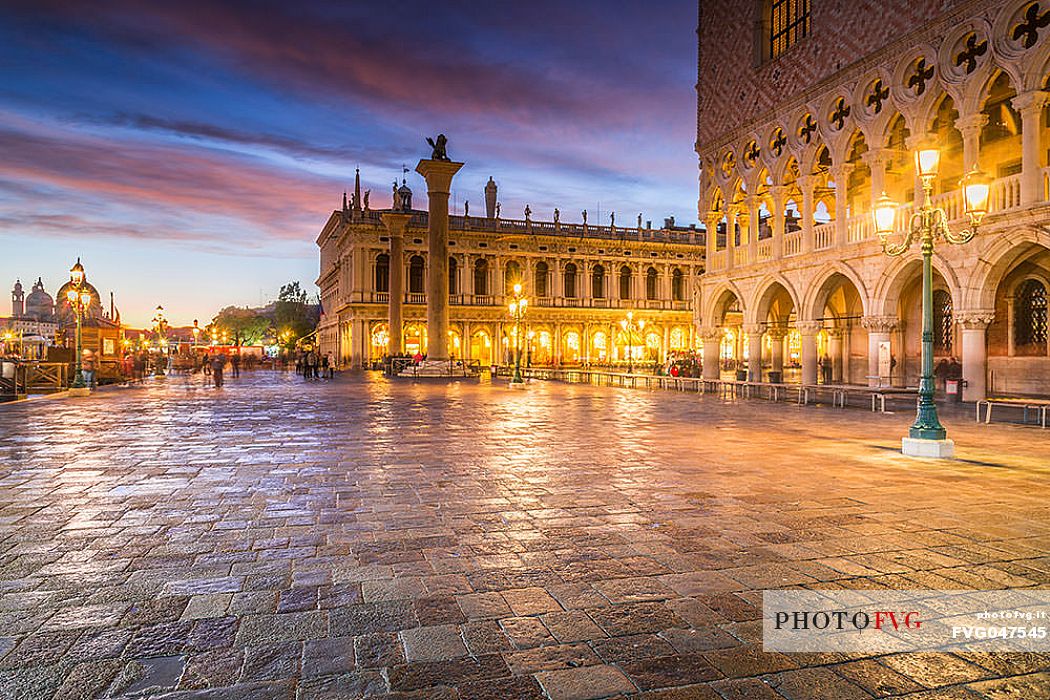 Piazza San Marco at dusk, with the Marciana Library, the columns of San Todaro and San Marco and the Doge's Palace, Venice, Italy, Europe