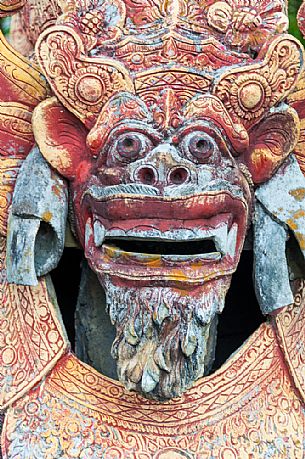 Ancient statue of the Dragon in Tirta Gangga water palace, Bali island, Indonesia