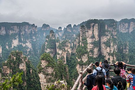 Tourists admiring the Hallelujah mountains or Avatar mountains in the Zhangjiajie National Forest Park, Hunan, China