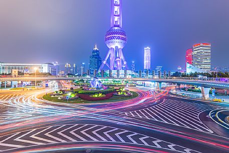 Night view of a roads in Lujiazui New Financial District with Oriental Pearl Tower in Shanghai city, China