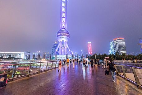 Lifestyle in Shanghai city, in the background the Oriental Pearl Tower  lighting, Shanghai, China