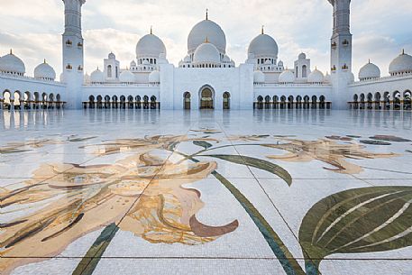 The courtyard of Sheikh Zayed Grand Mosque in Abu Dhabi with two minarets, Emirate of Abu Dhabi, United Arab Emirates, UAE