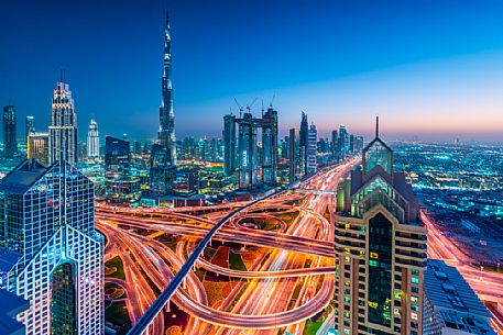 Burj Khalifa and High Rises on Sheikh Zayed Road at twilight, Downtown Dubai, Emirate of Dubai, UAE, Asia