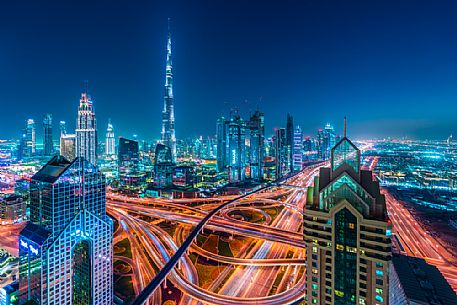 Burj Khalifa and High Rises on Sheikh Zayed Road at twilight, Downtown Dubai, Emirate of Dubai, UAE, Asia