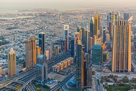 Sunrise from the top panoramic platform on Burj Khalifa across Sheikh Zayed Road and the high rises, Downtown Dubai, Emirate of Dubai, UAE, Asia