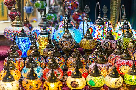 Traditional multicolored eastern glass lamps lighting on Dubai souk, United Arab Emirates, Asia