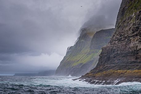 View from the sea of ​​the Vestmanna Sea Cliffs, Streymoy island, Faeroe islands, Denmark, Europe