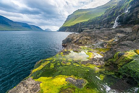 Wild coast near Mikladalur village, Kalsoy Island, Faeroe Islands, Denmark, Europe