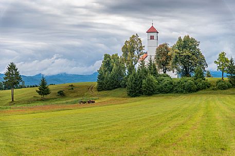 Iconic church in the rural landscape of Cerknica, Slovenia, Europe