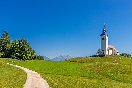 Križna Gora Church and the Kamnik Alps, Škofja Loka, Slovenia, Europe