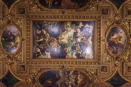 Tourist taking a picture inside the Scuola Grande di San Rocco, Venice, Veneto, Italy, Europe